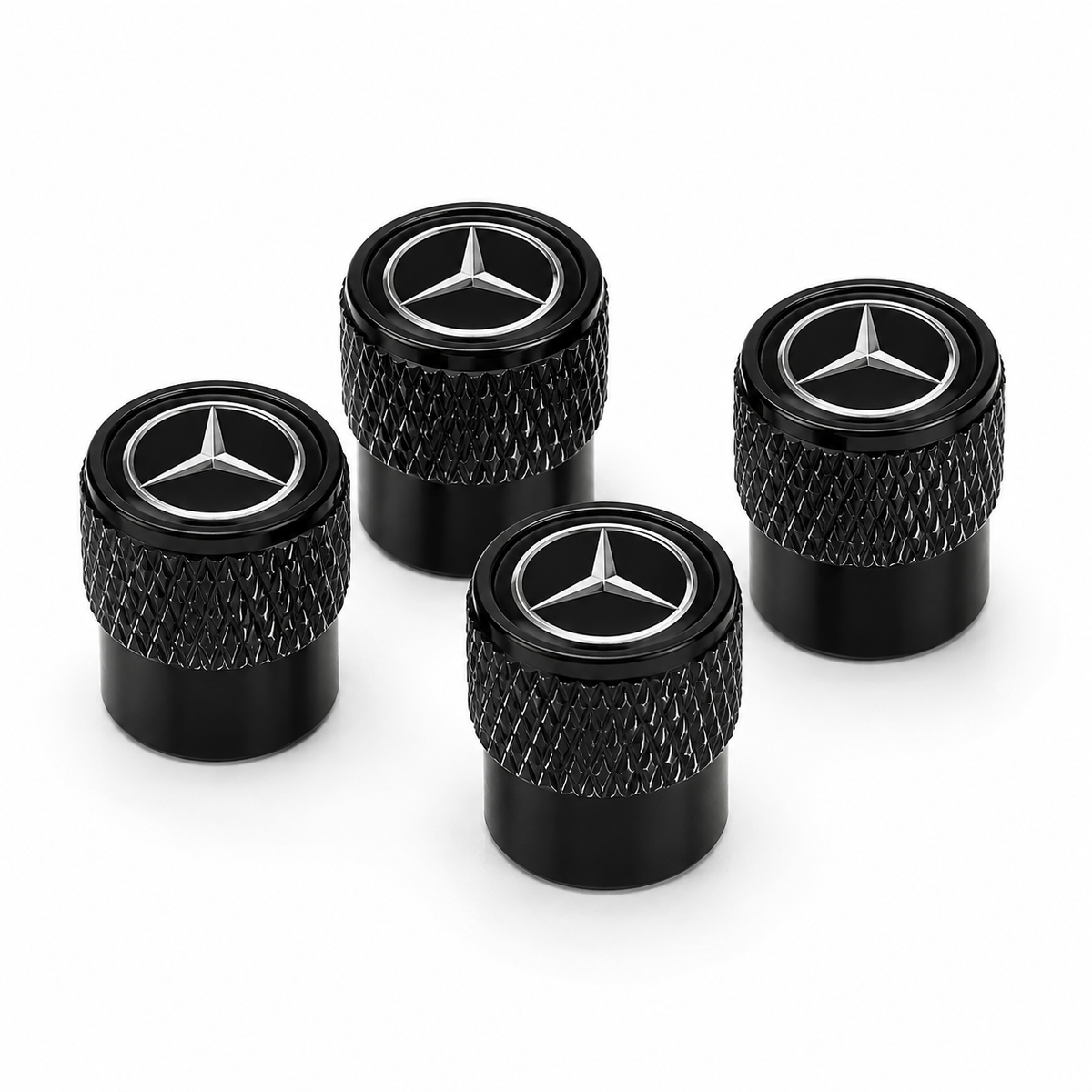 Štyri čierne čiapočky ventilov s logom Mercedes-Benz